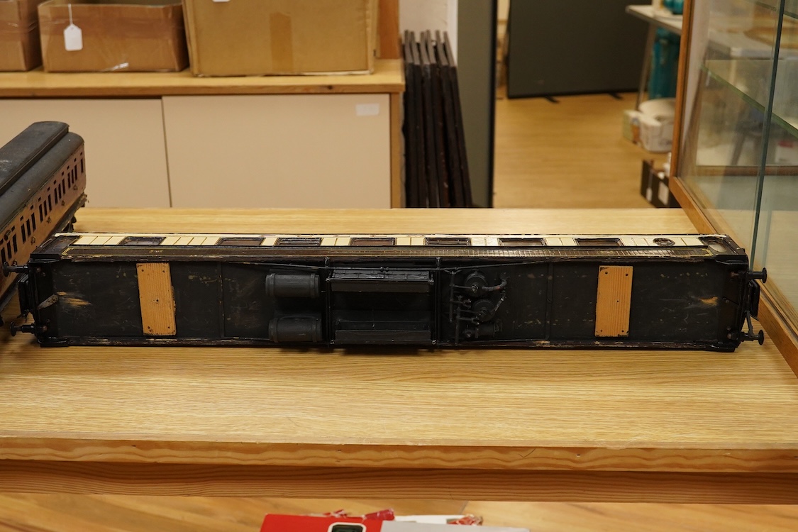 Two Gauge One bogie coaches; a Midland Railway clerestory coach, together with a 12-wheel Pullman car (bogies af), plus an American outline caboose, some scratch building and adaptation from kits, etc.